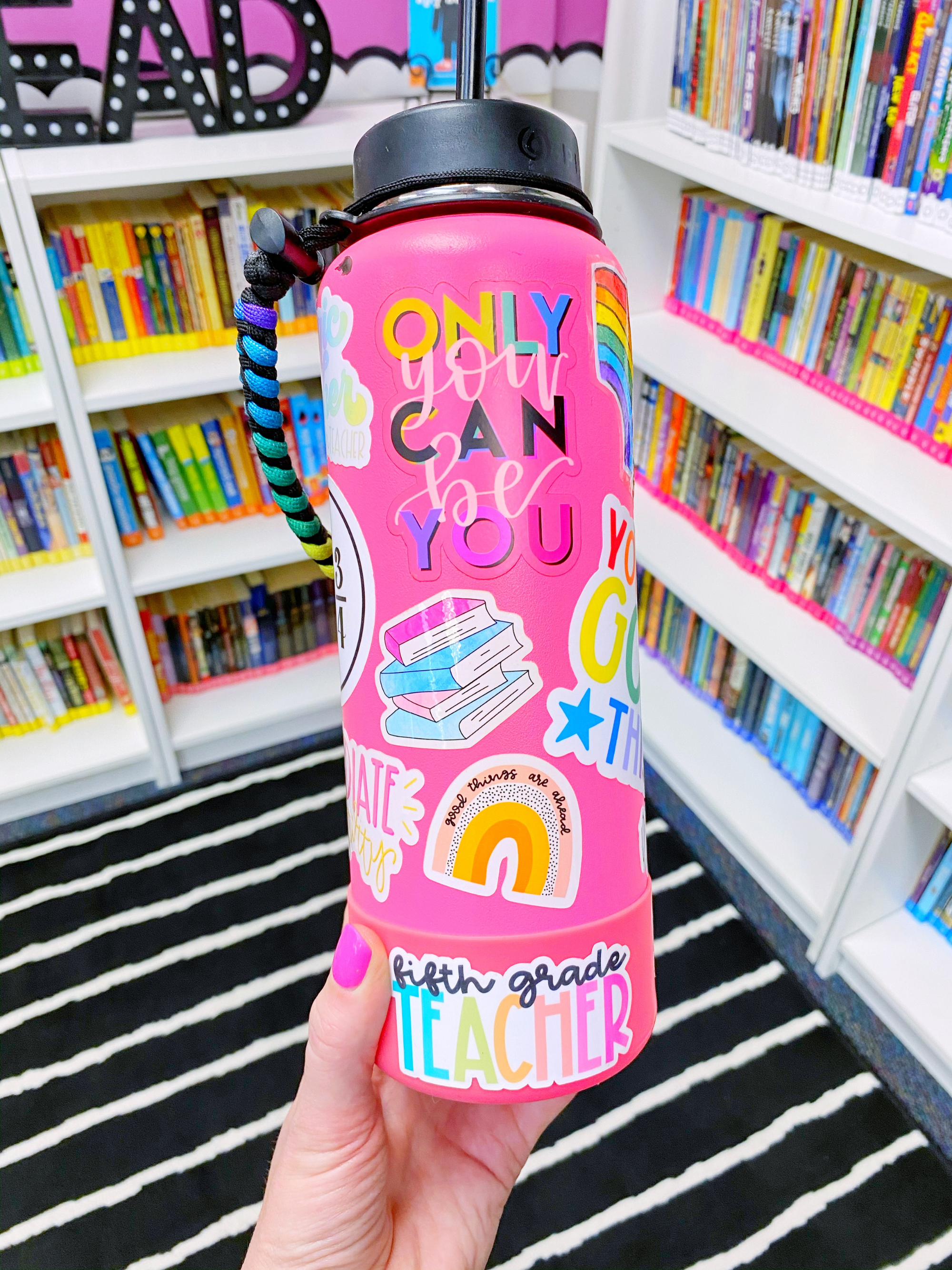 Teacher water bottle stickers on a pink hydroflask! My favorite teacher stickers are linked below!